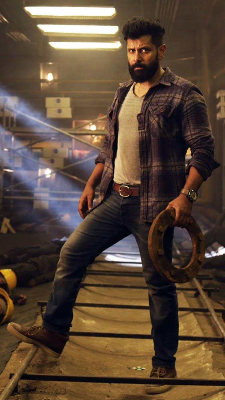 Vikram in a Serious Look  HD Wallpaper
