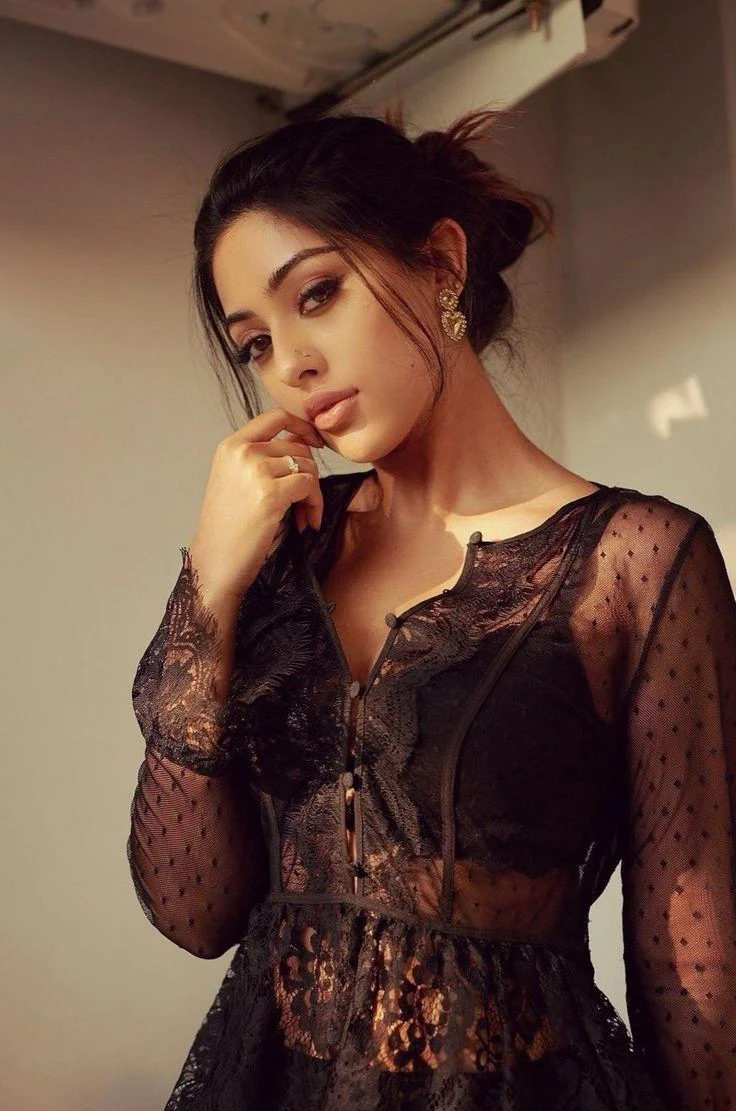 Anu Emmanuel in Bold Black Lace Dress Hd Image
