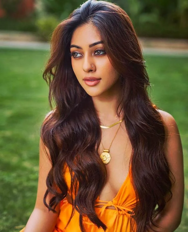Anu Emmanuel in Bold Orange Outfit Hd Image
