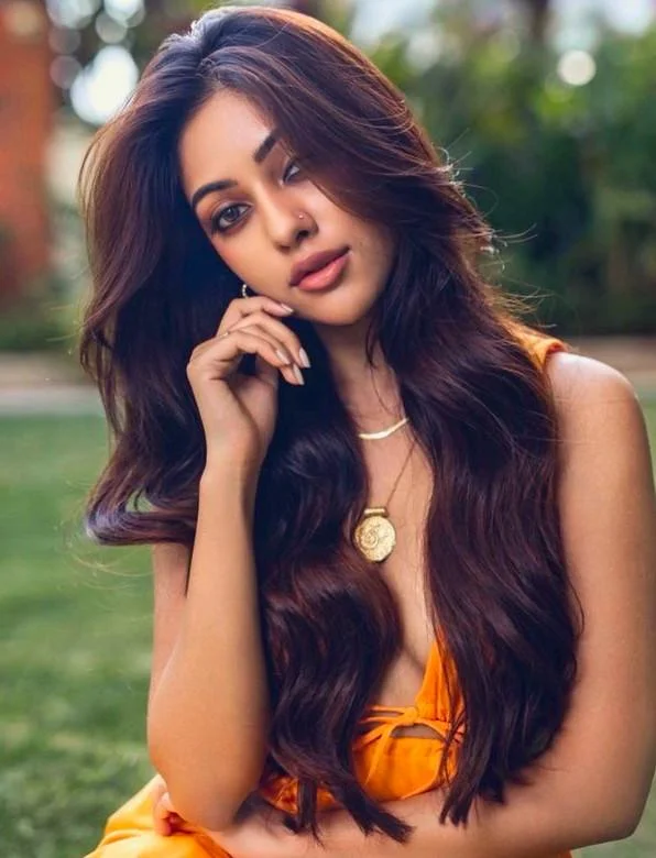 Anu Emmanuel in Bold Orange Outfit Hd Pic