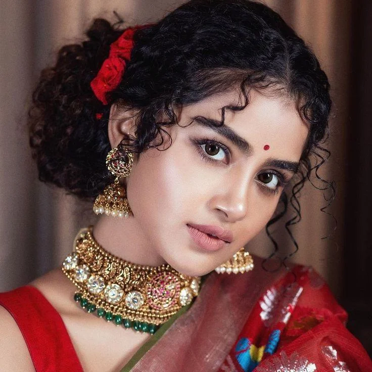 Anupama Parameswaran in Elegant Red Saree Look