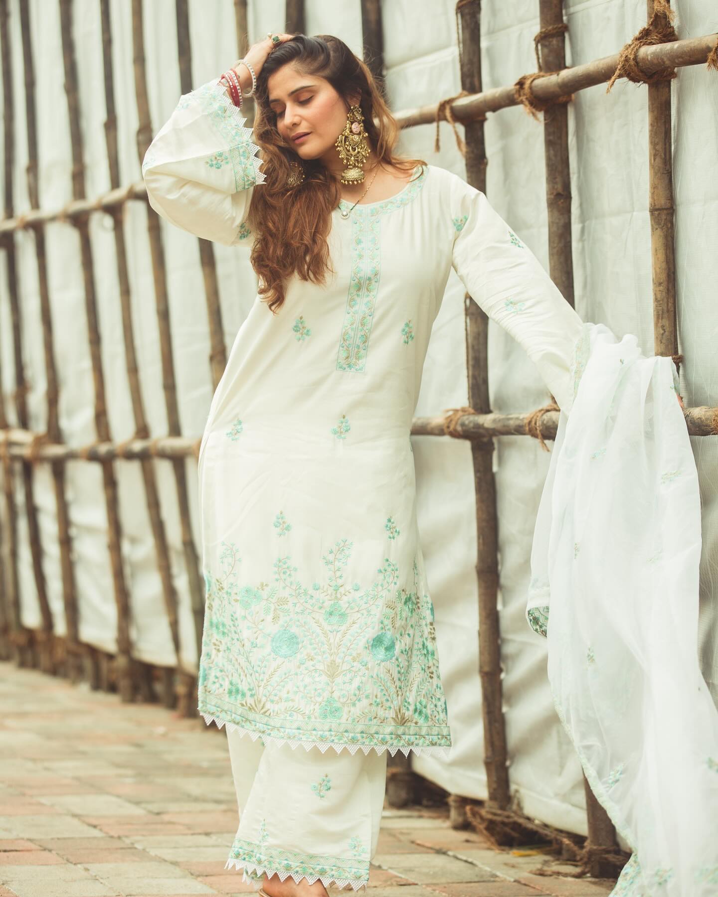 Arti Singh dressed in elegant white traditional attire image