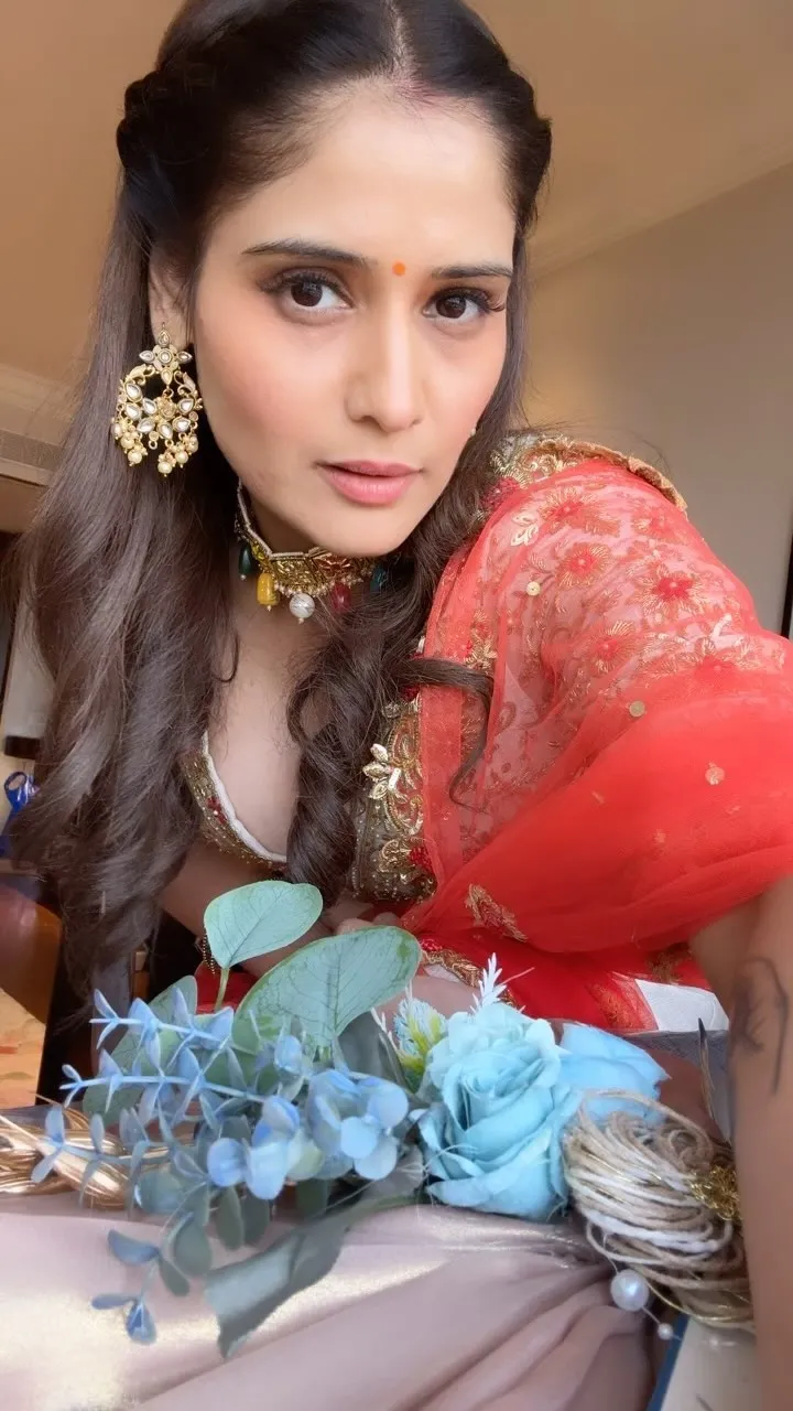 Arti Singh looking bold in a red and blue floral outfit