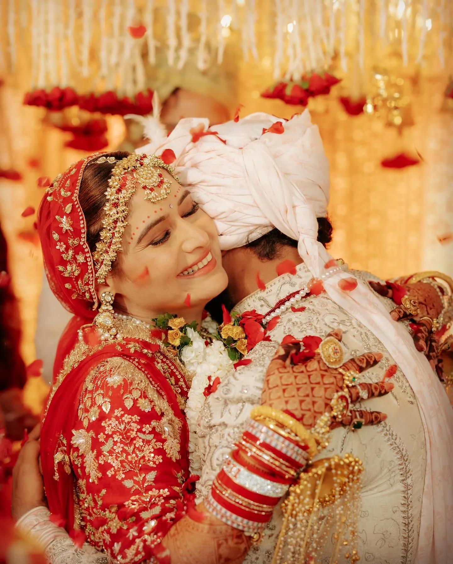 Arti Singh is sharing a joyful wedding moment with her groom