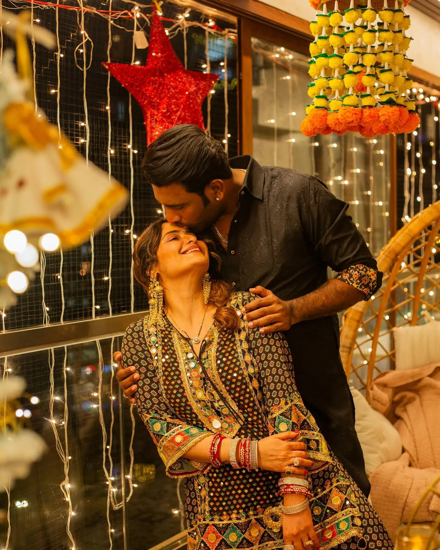 Arti Singh and her partner share a romantic look with decor
