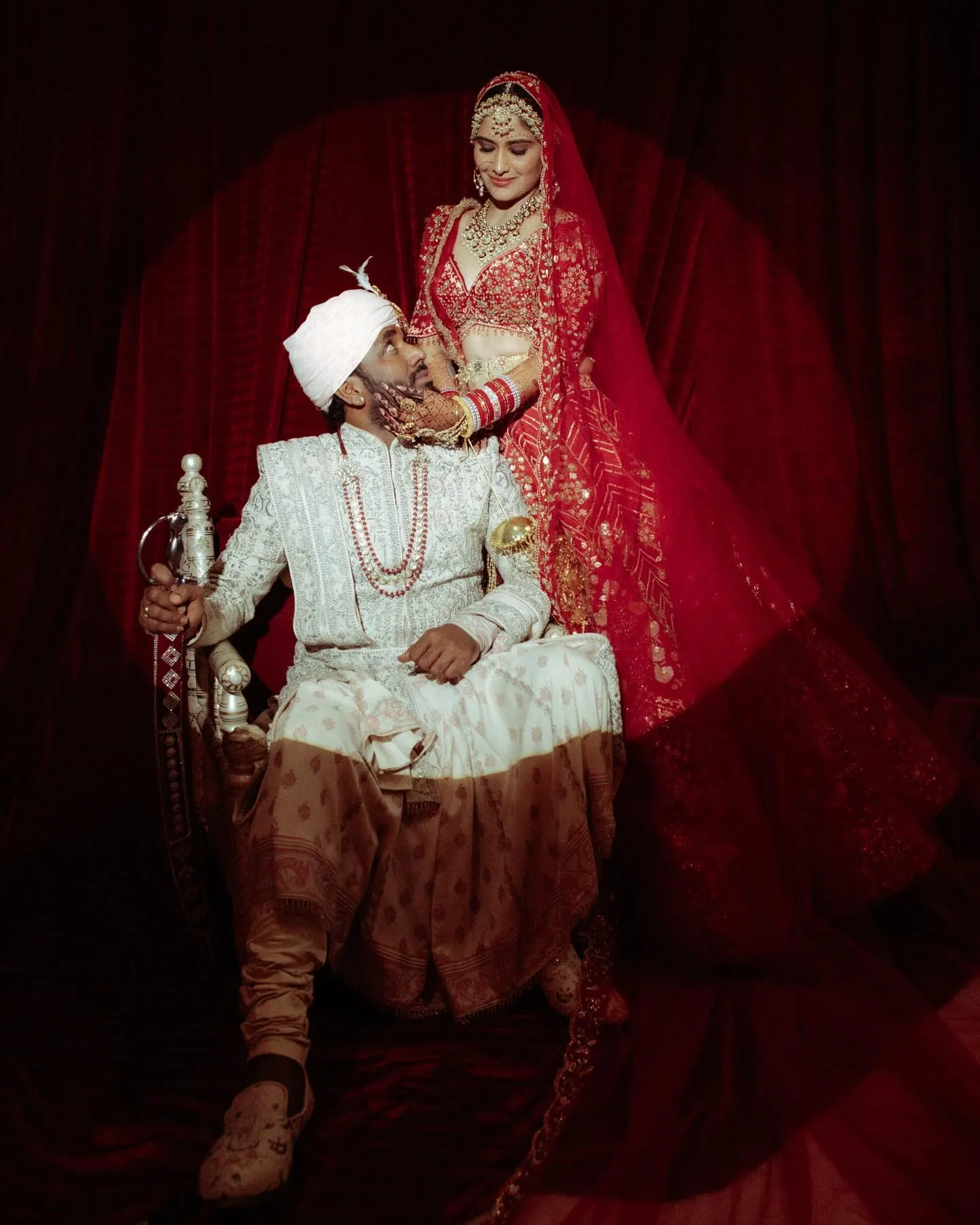 Arti Singh and the groom pose royally on their wedding day