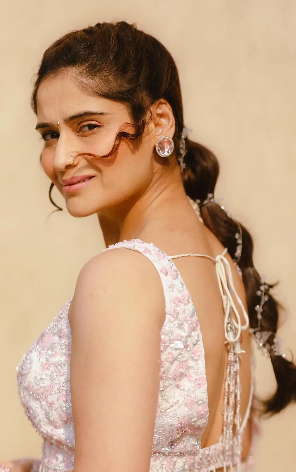 Arti Singh celebrates Holi with colors and traditional joy