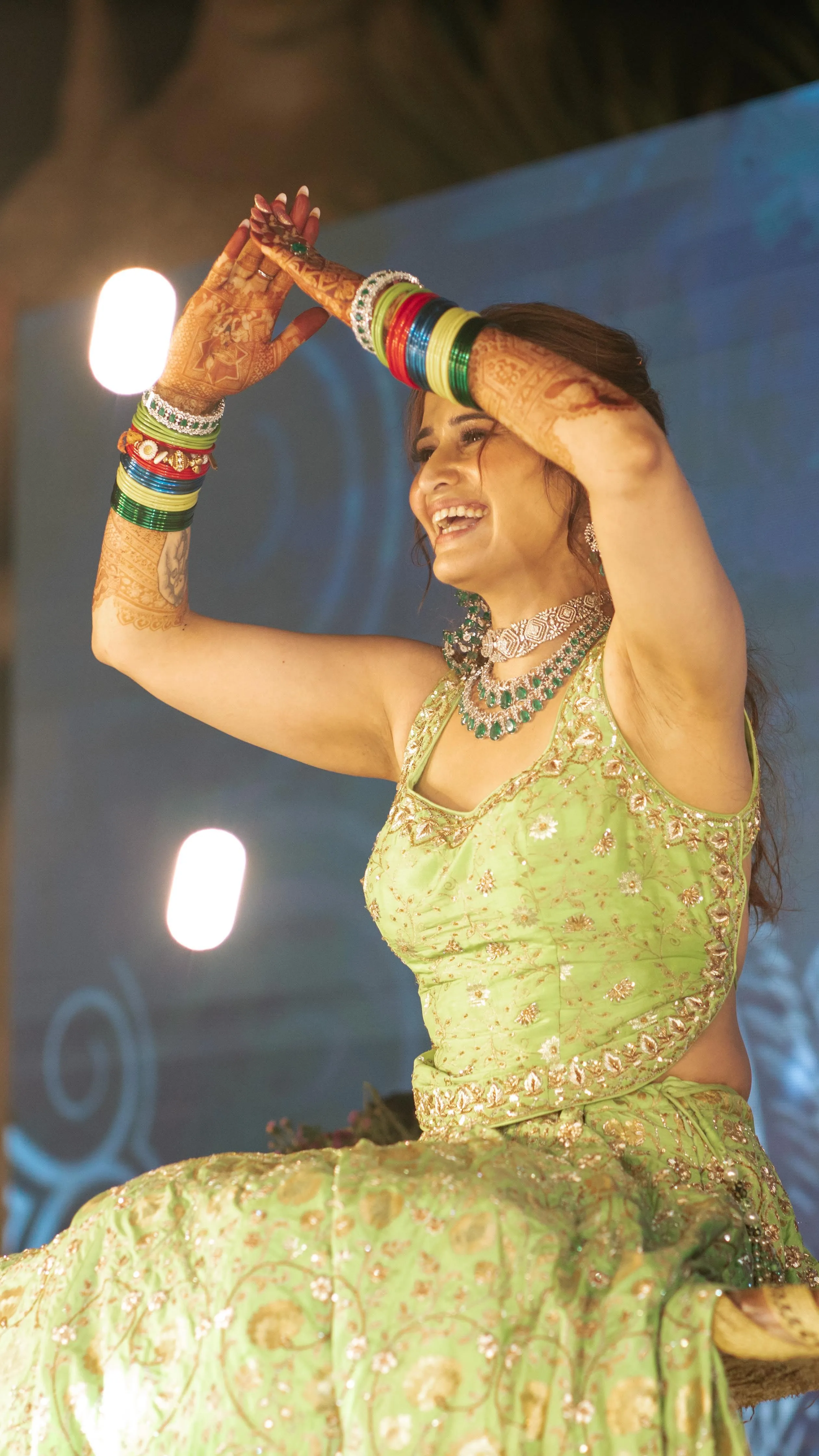 Arti Singh dances joyfully in a sparkling green lehenga look