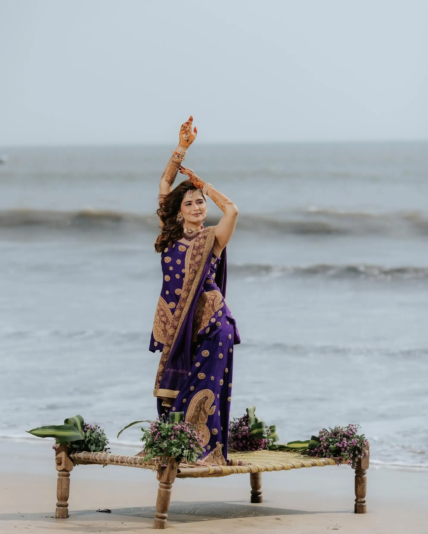 Arti Singh dances on the beach wearing purple lehenga outfit