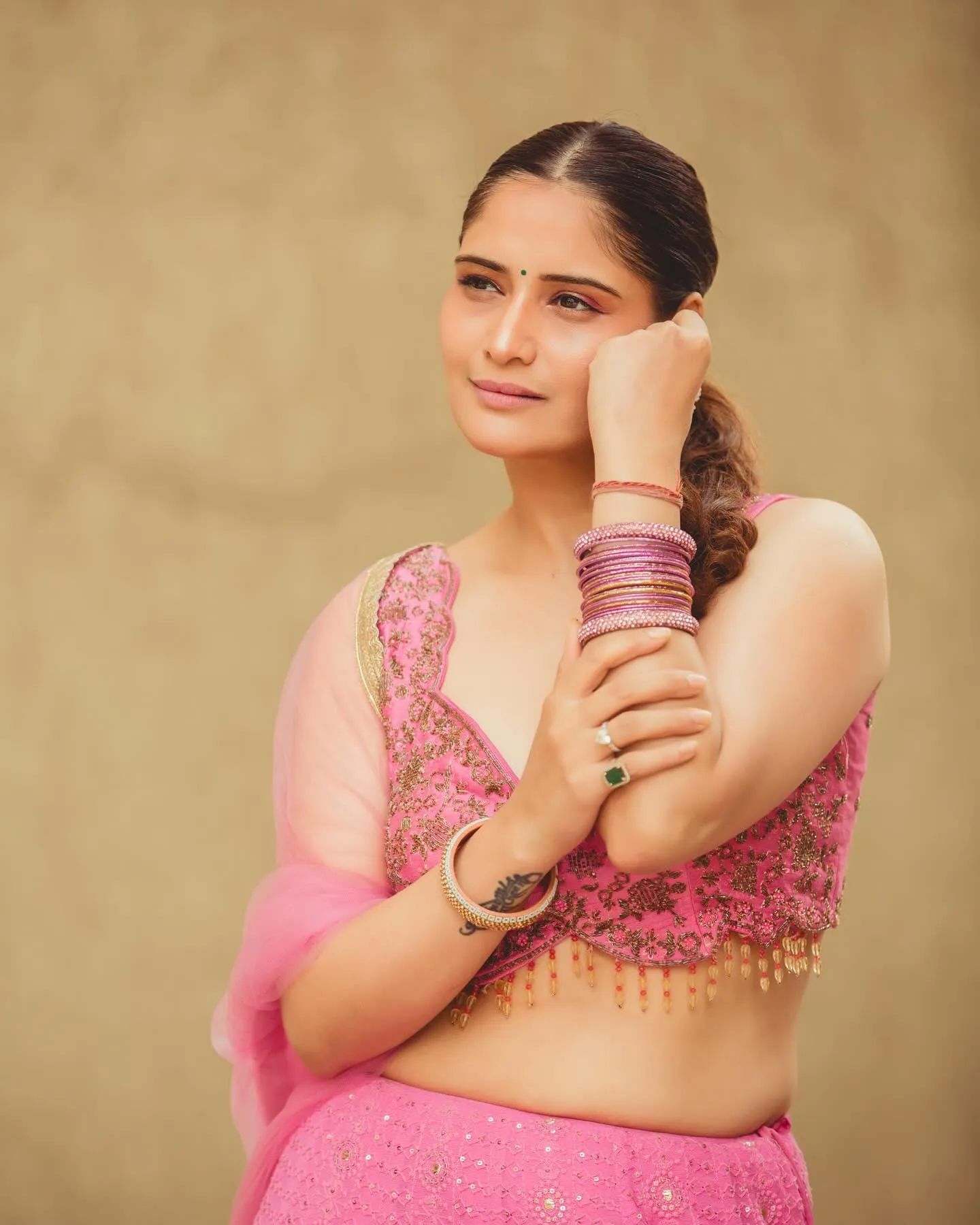 Arti Singh in a pink blouse and traditional wear wallpaper