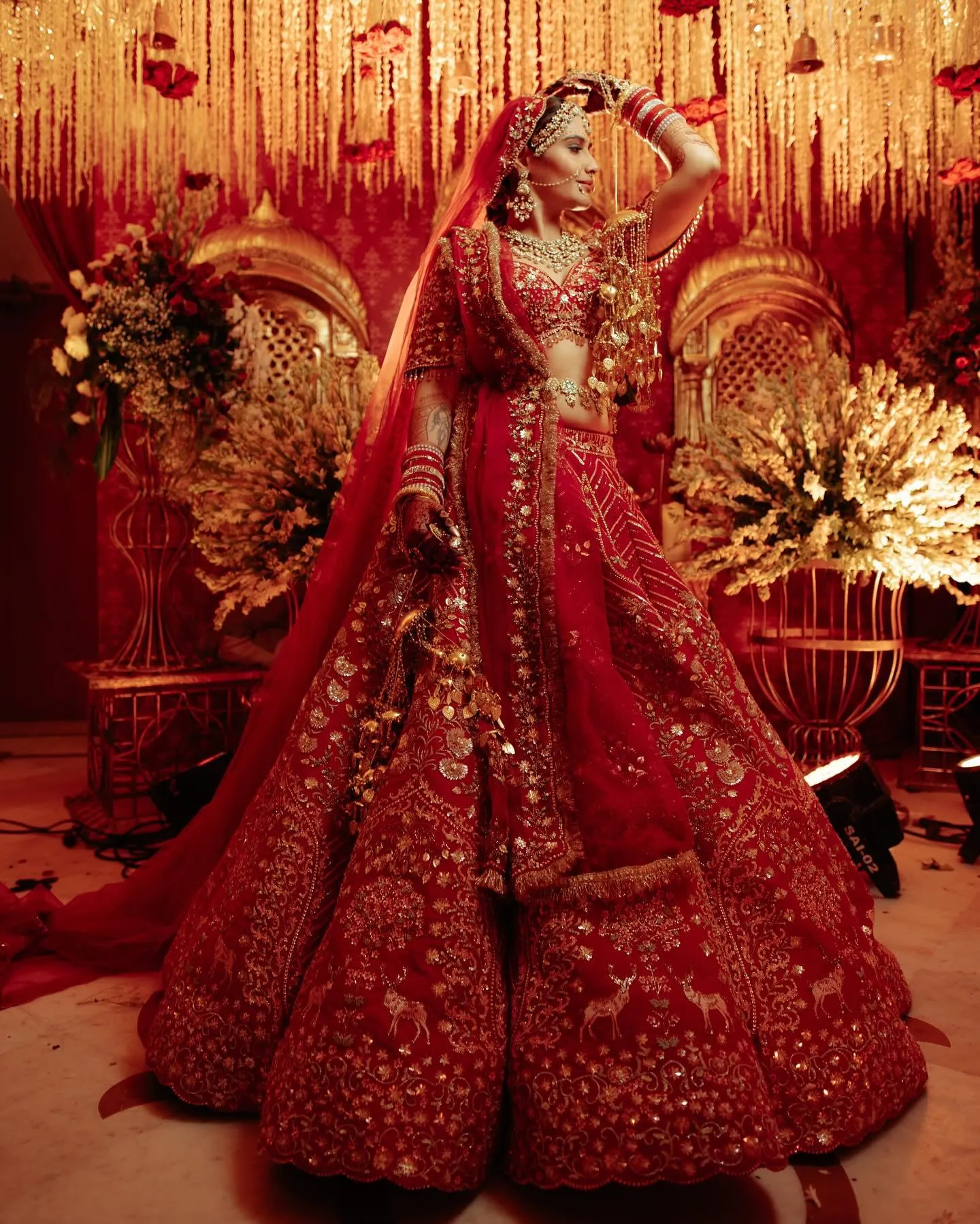 Arti Singh looks regal in traditional red bridal attire