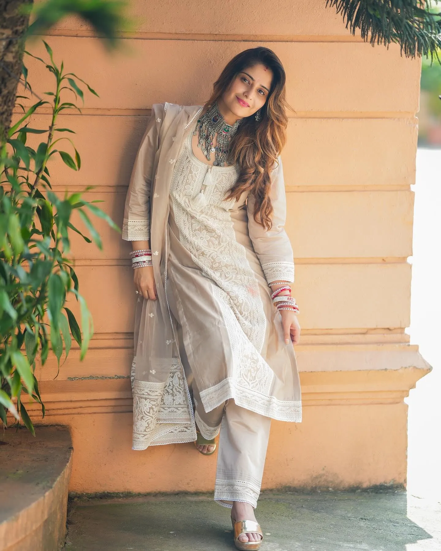Arti Singh looks stylish in a white embroidered kurta set