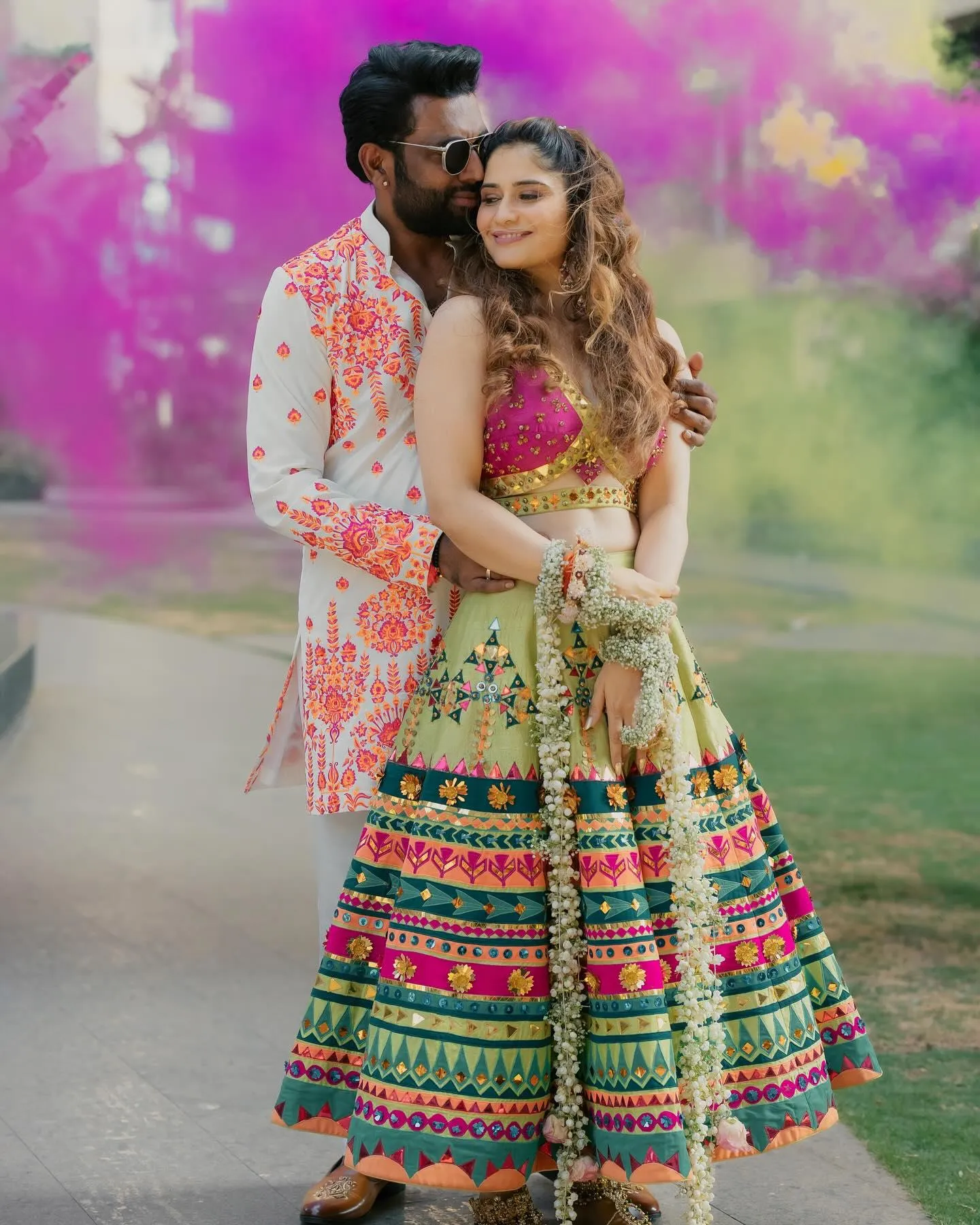 Arti Singh poses with her husband in vibrant festive attire
