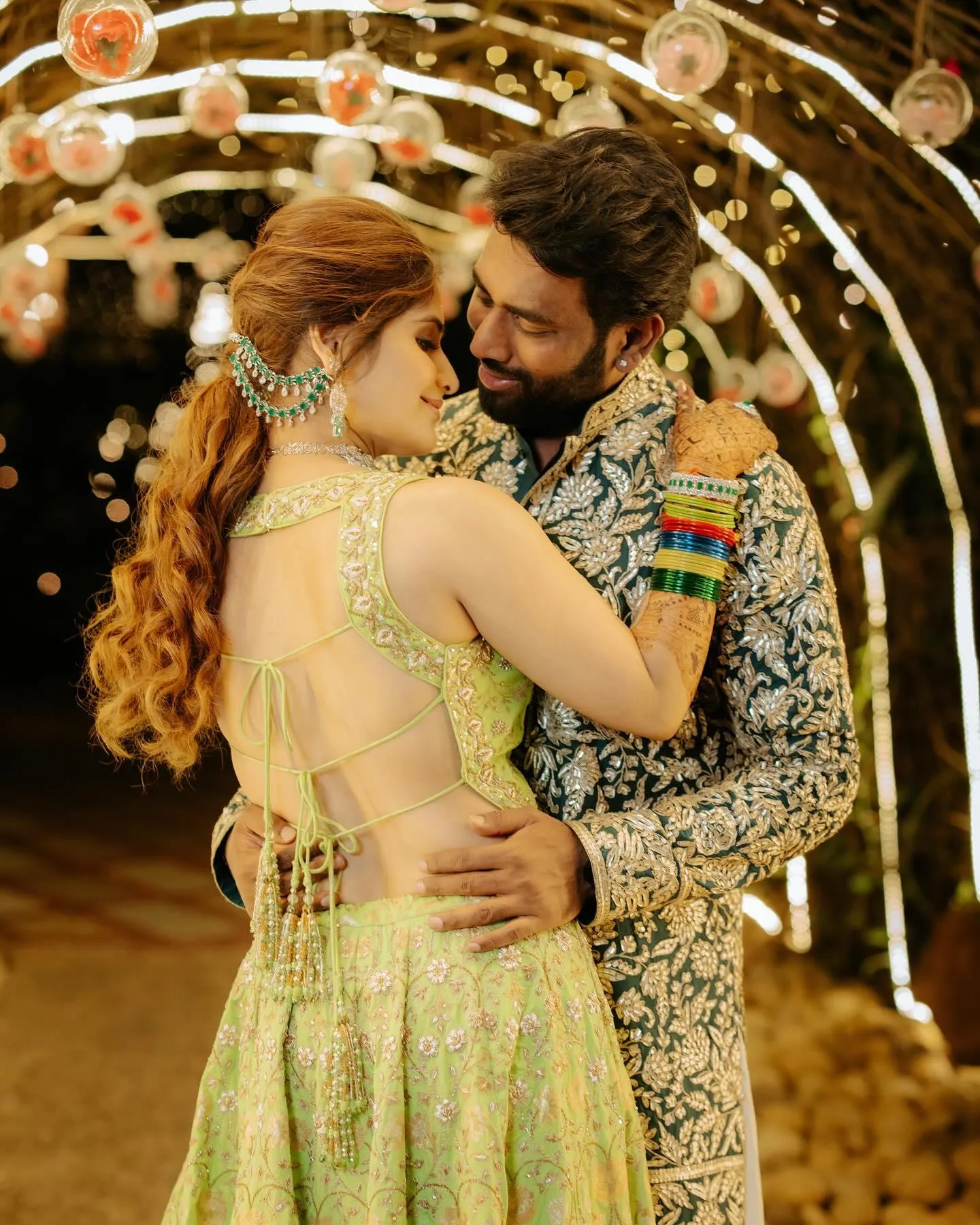 Arti Singh shares a romantic dance moment in pastel lehenga