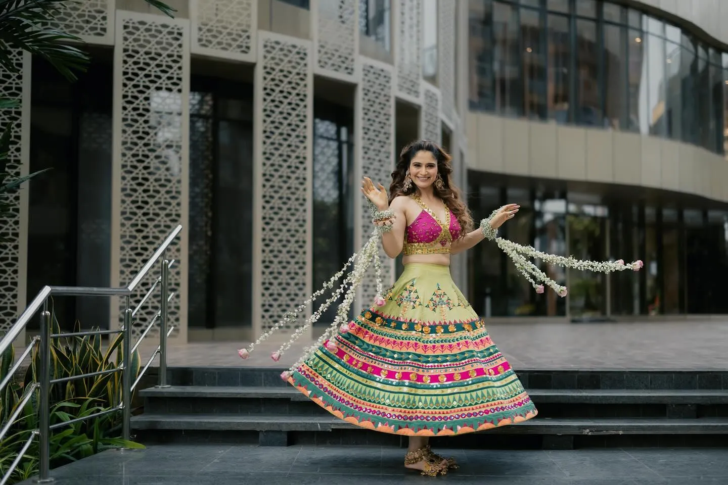 Arti Singh twirls in a colorful lehenga with joyful energy