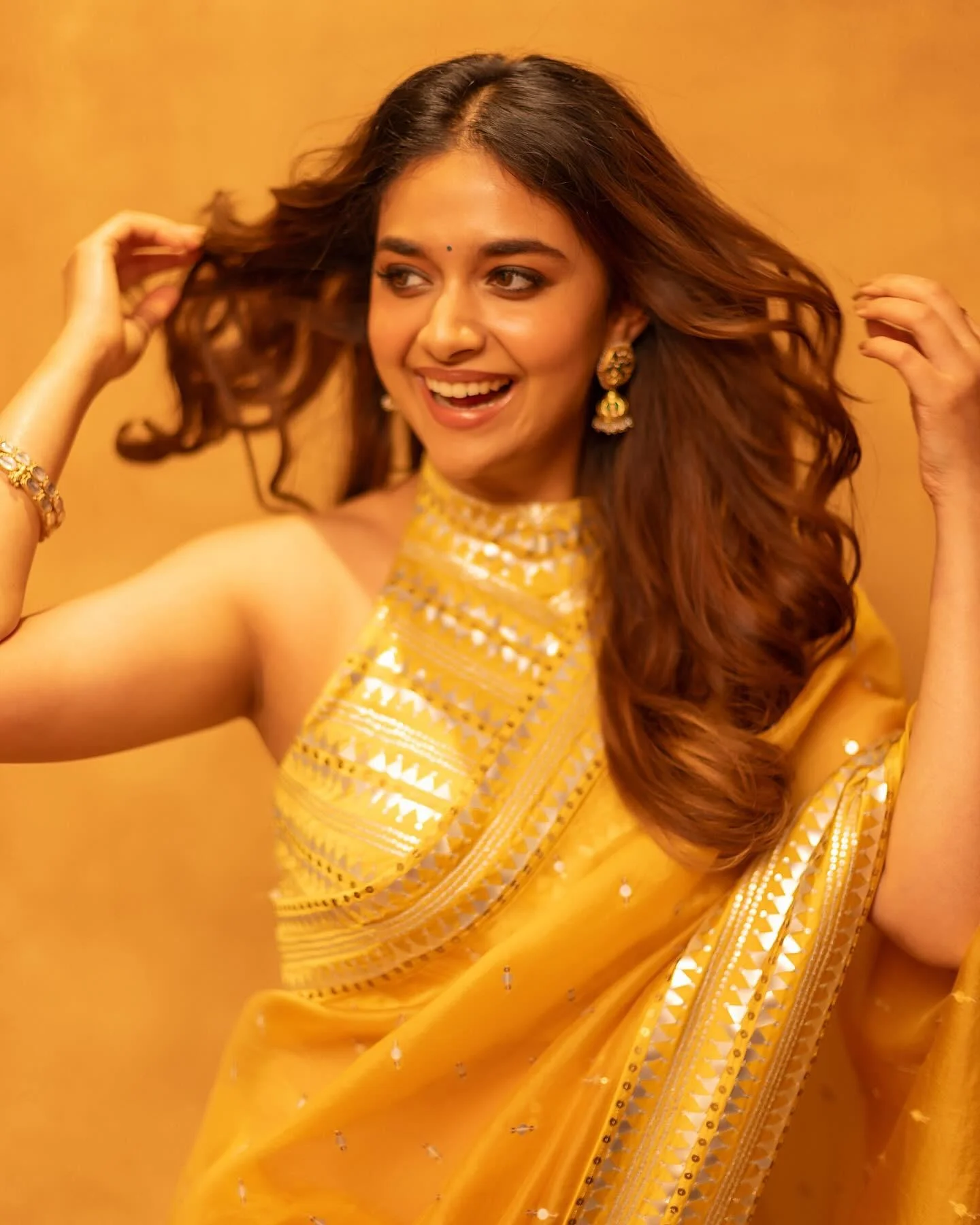 Actress Keerthy Suresh in Elegant Yellow Saree Look