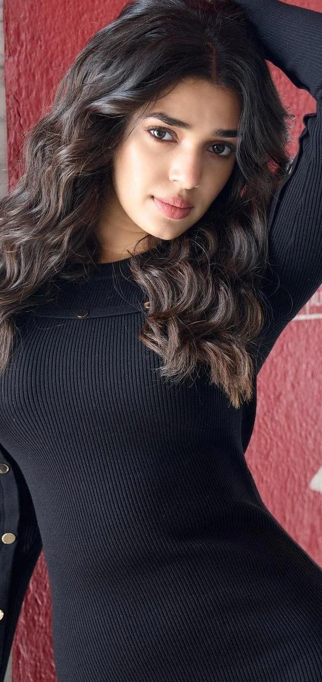 Actress Krithi Shetty in Black Tshirt Hd Image