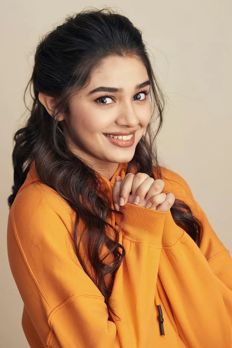 Krithi Shetty in Orange Hd Image
