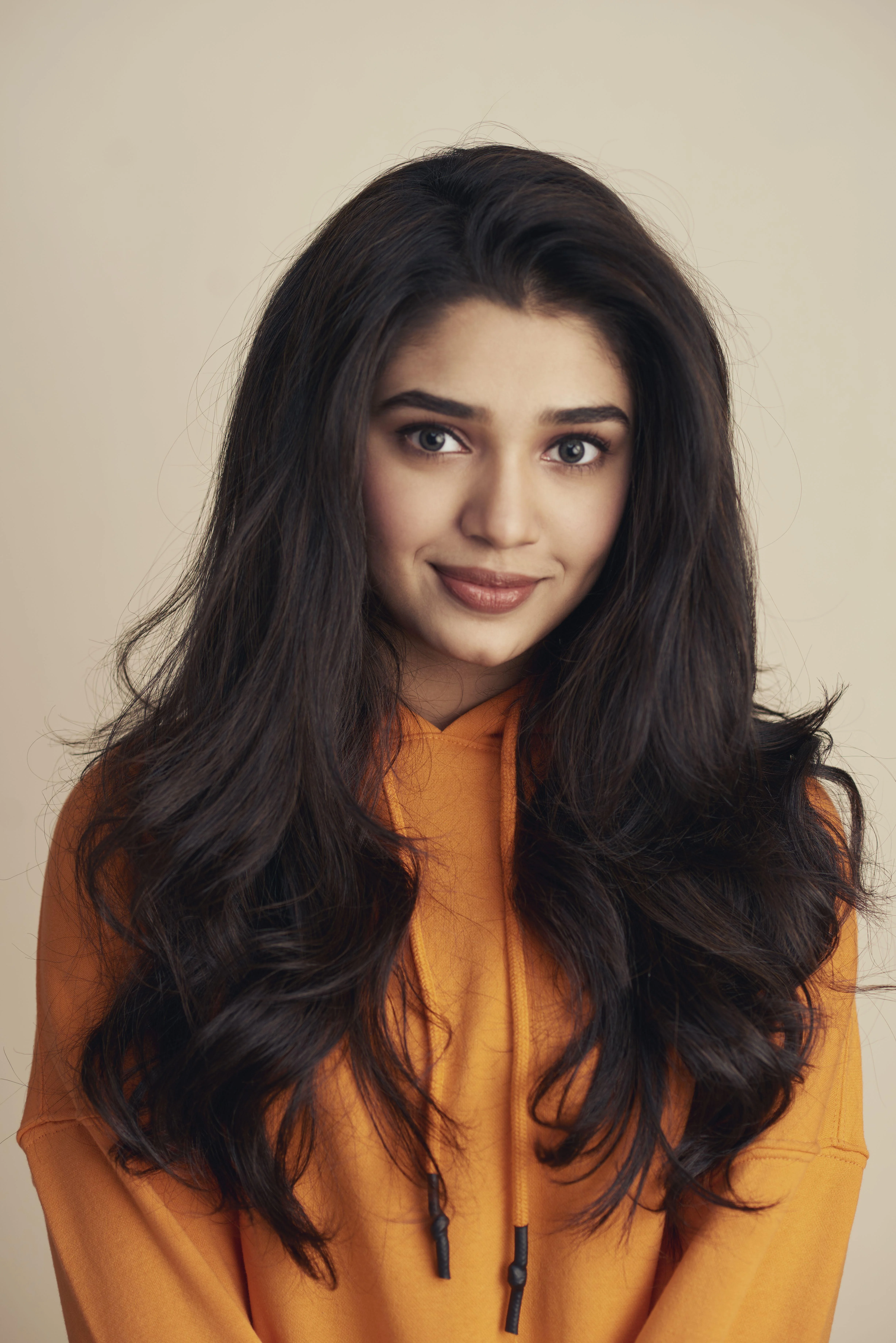 Krithi Shetty in Orange Hd Wallpaper