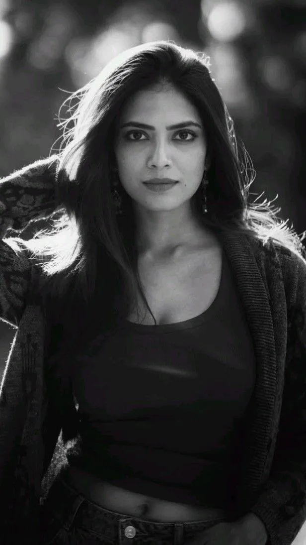 Attractive Malavika Mohanan in Black Outfit Bold Portrait