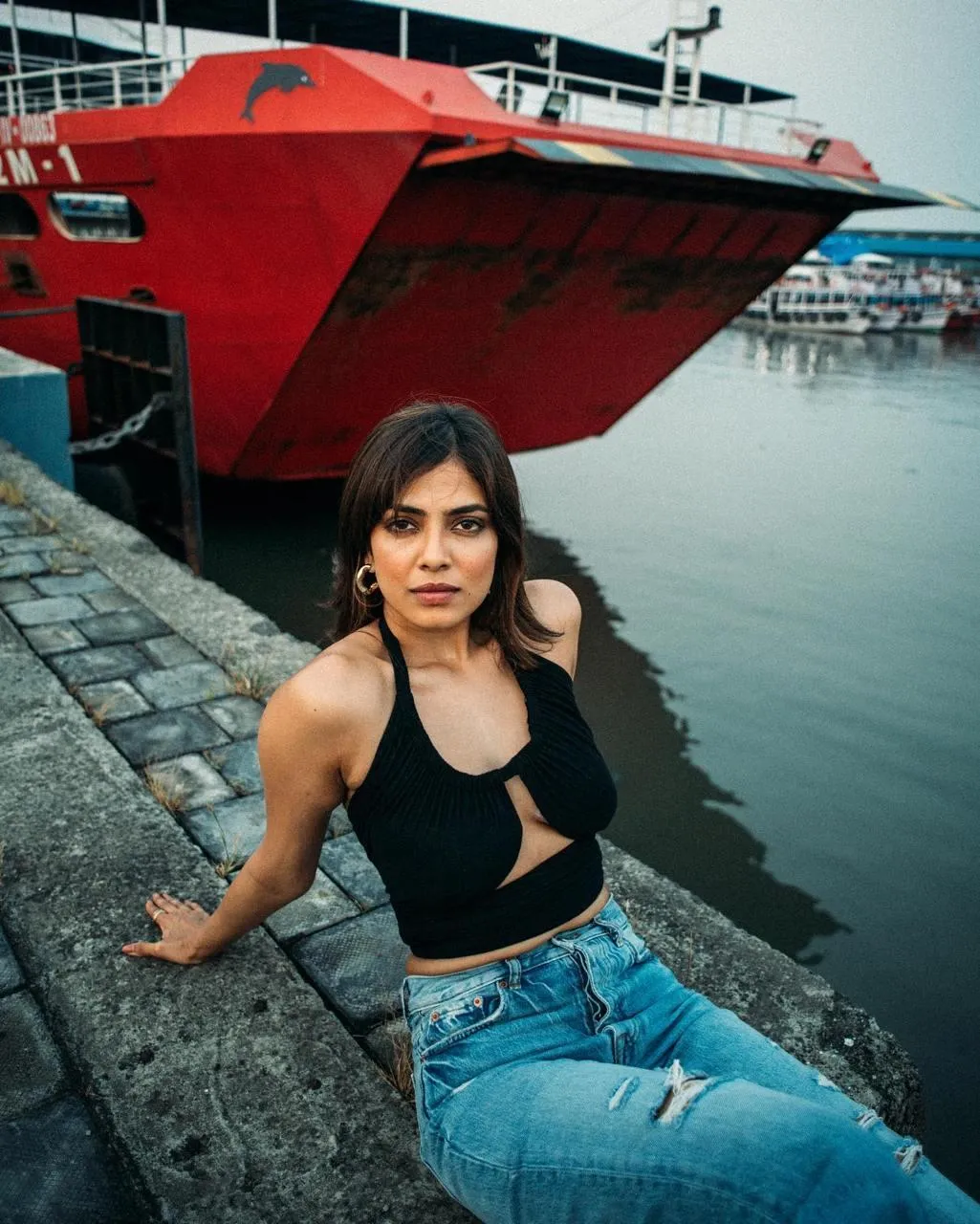 Attractive Malavika Mohanan in Black Top Jeans Outdoors