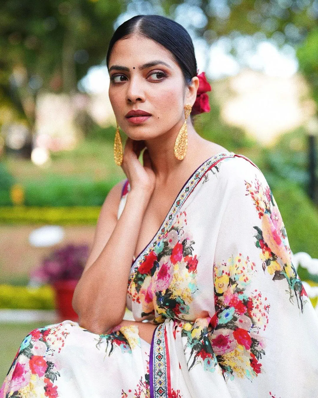 Attractive Malavika Mohanan in Floral Saree Elegant Pose