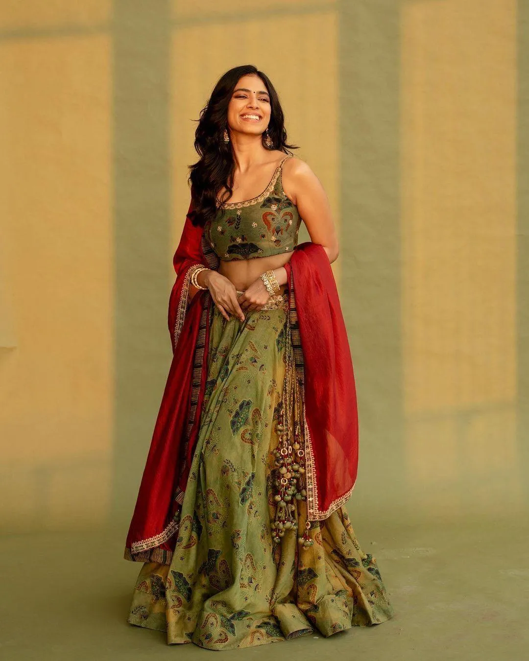 Attractive Malavika Mohanan in Green Gown Ethnic Fashion