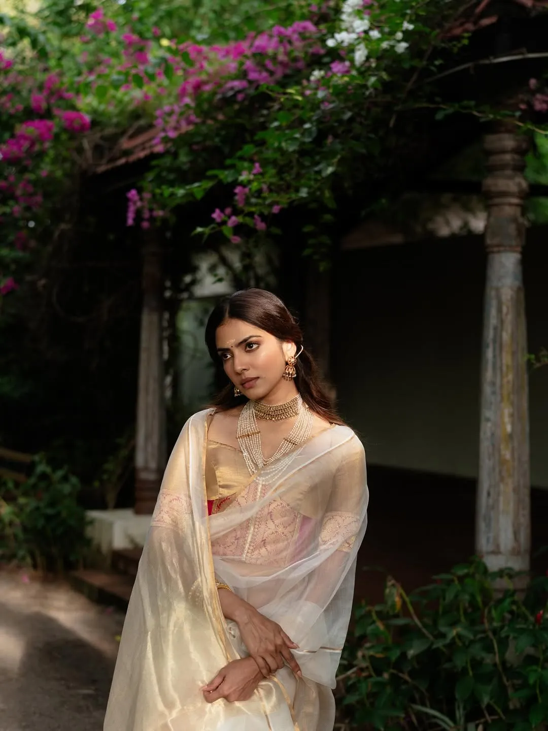 Attractive Malavika Mohanan in Pastel Gown Garden View Image