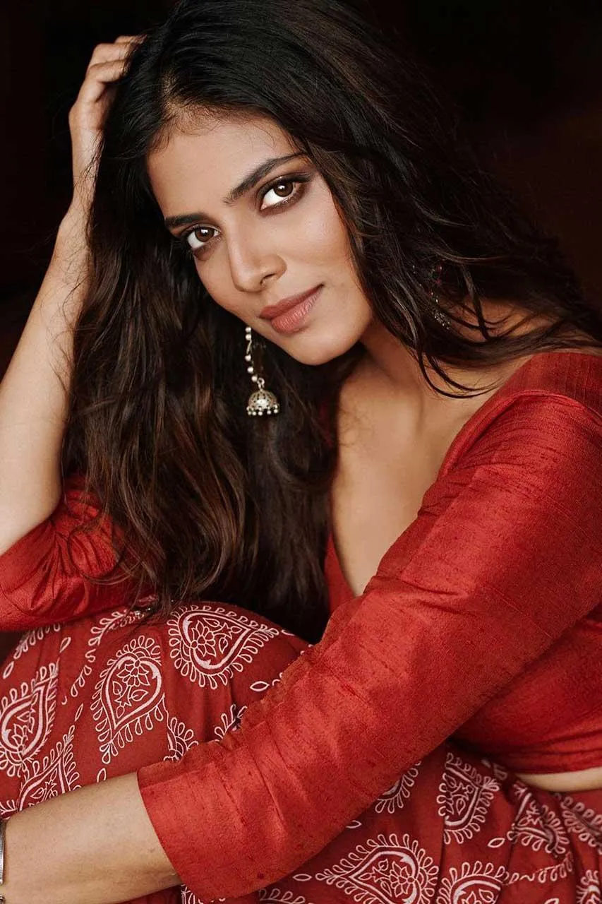 Attractive Malavika Mohanan in Red Gown Chic Portrait Image