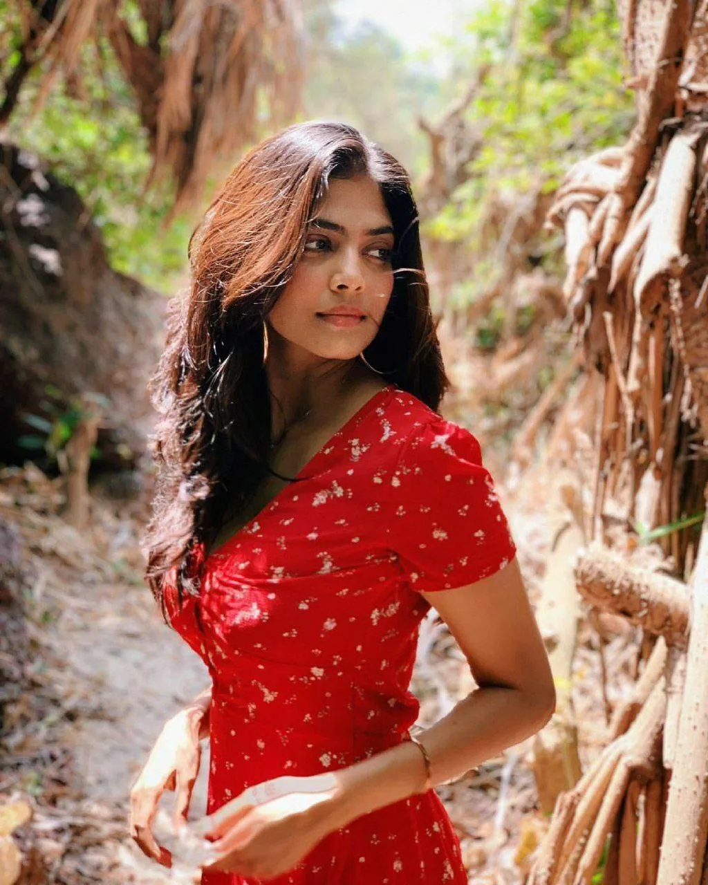 Attractive Malavika Mohanan in Red Printed Dress Look Image