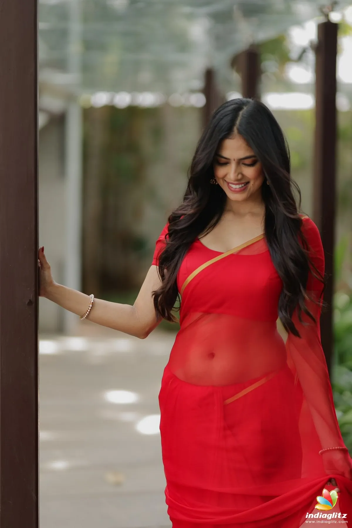 Attractive Malavika Mohanan in Stylish Red Gown Dress Image