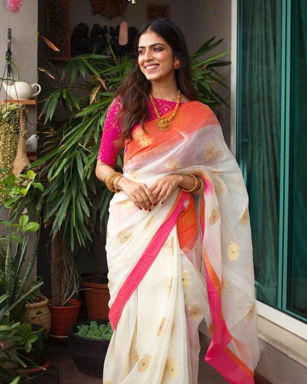 Attractive Malavika Mohanan in Traditional Saree Outdoor