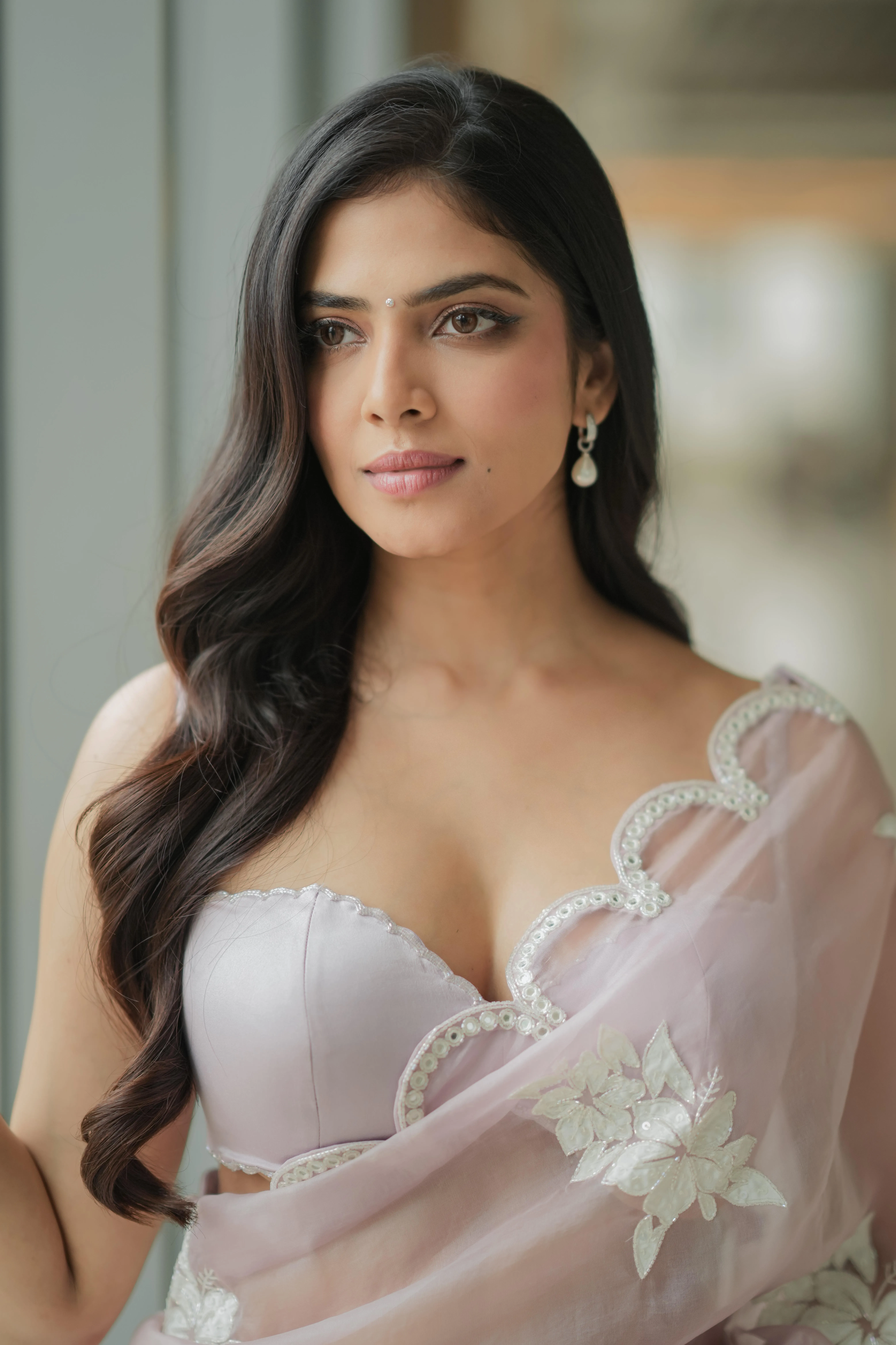 Attractive Malavika Mohanan in White Saree Stylish Look