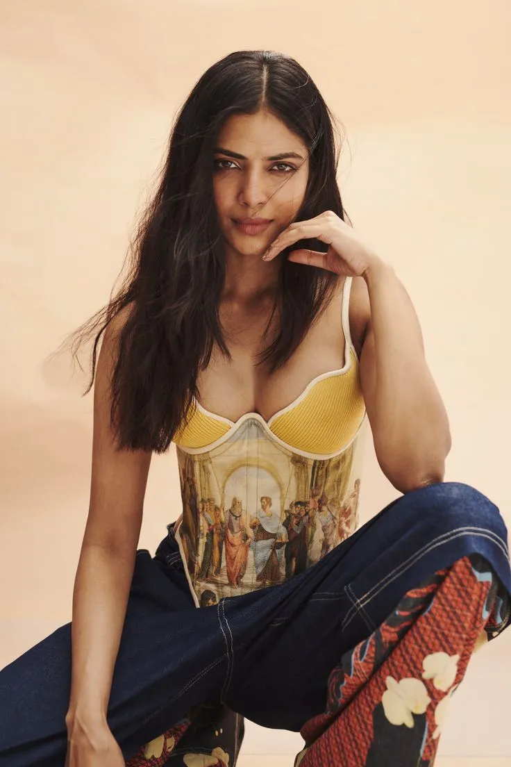 Attractive Malavika Mohanan in Yellow Printed Top Casual