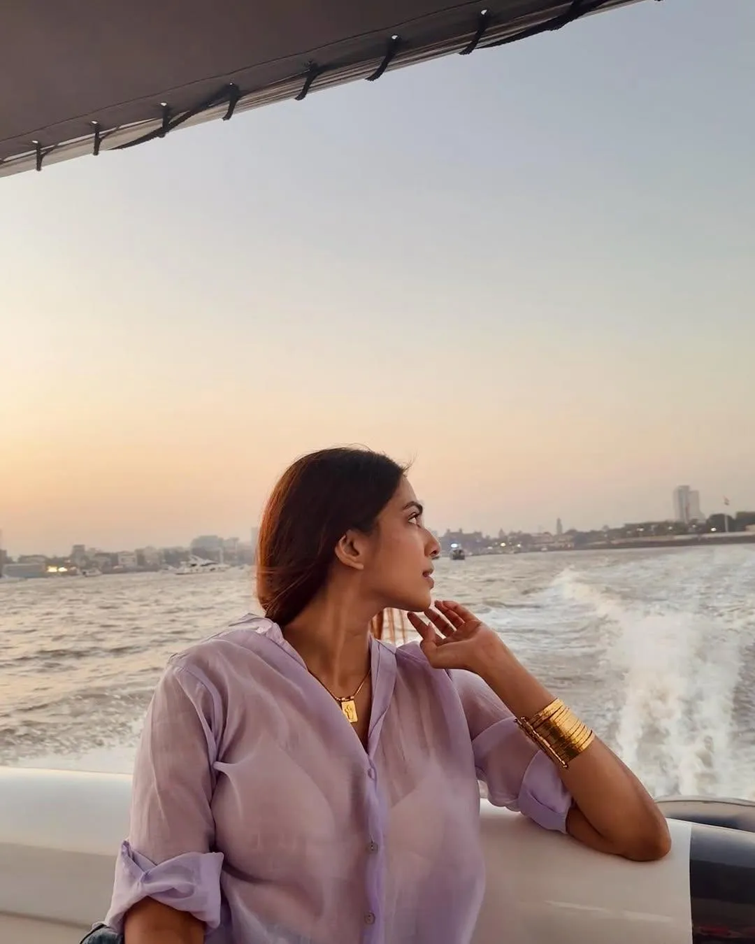 Attractive Malavika Mohanan Relaxed Sunset Fashion Shot