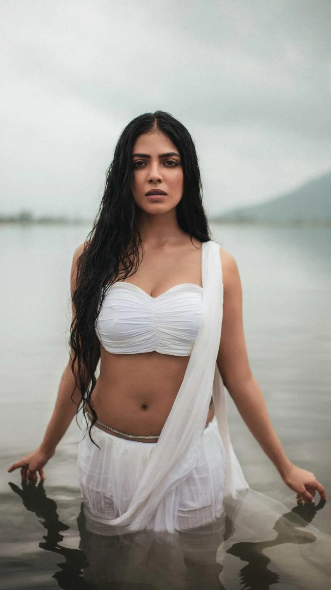 Attractive Malavika Mohanan Sporty White Outfit Portrait