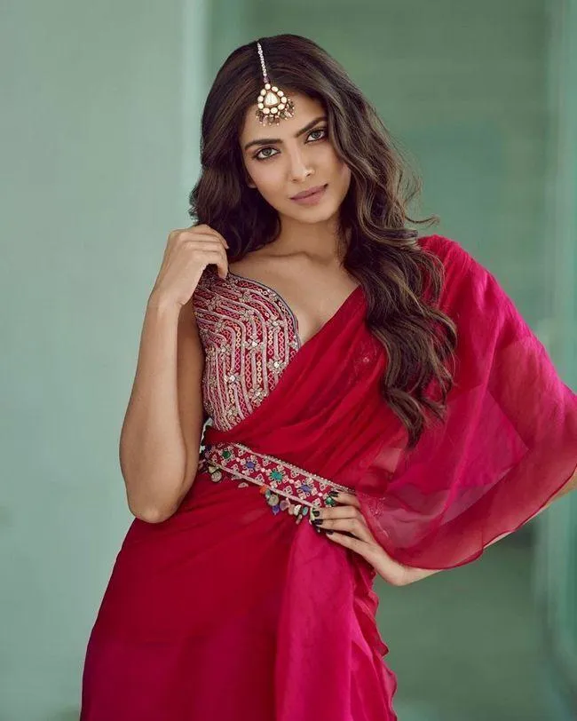 Attractive Malavika Mohanan Stunning Red Dress Pose Shot
