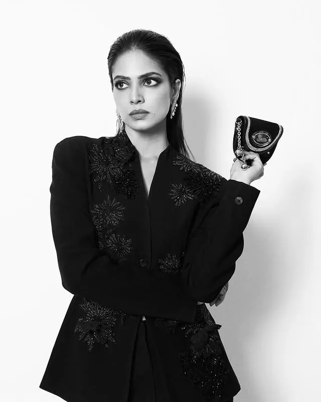 Attractive Malavika Mohanan Stuns in All Black Suit Image