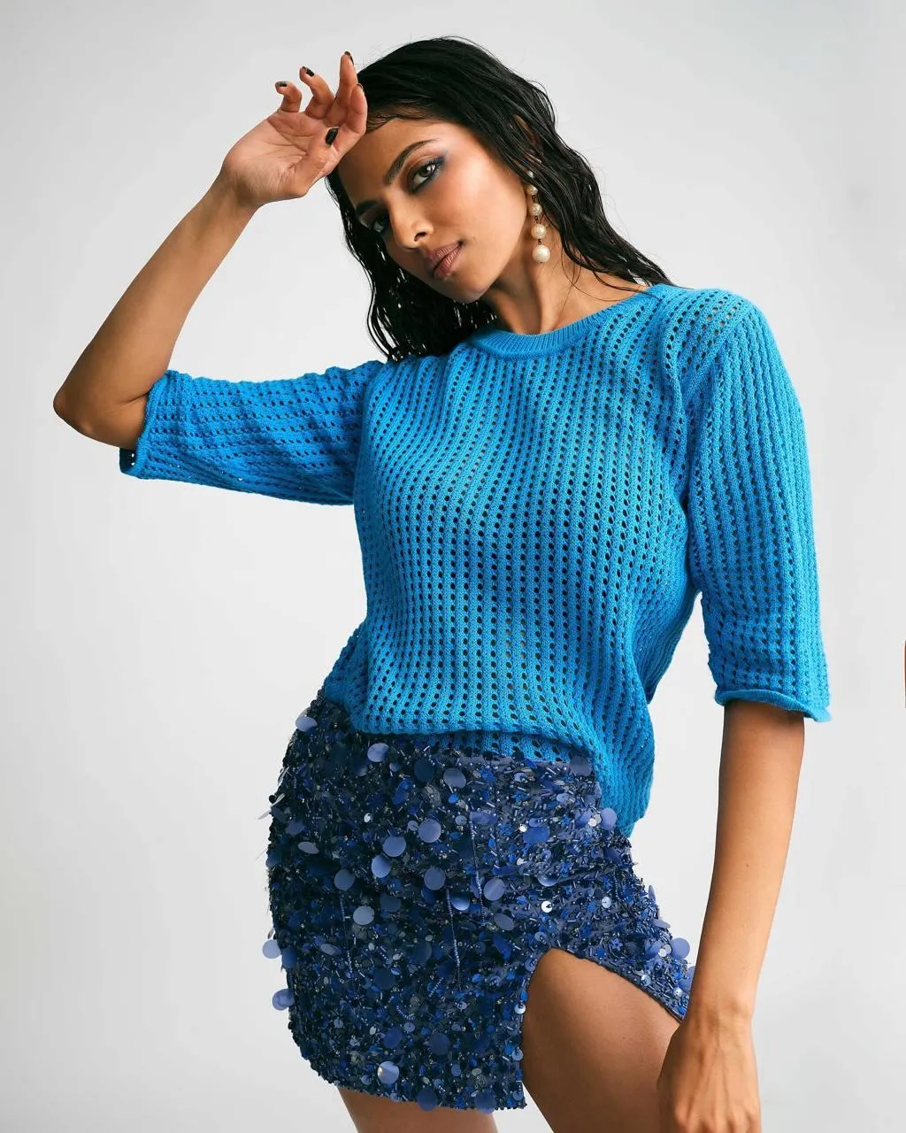 Attractive Malavika Mohanan Stylish Pose in Blue Outfit