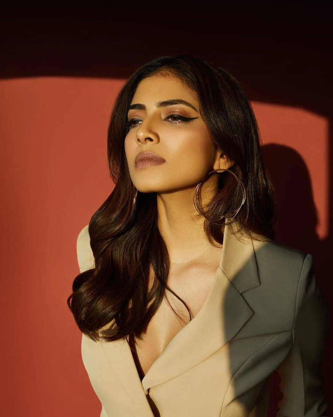 Attractive Malavika Mohanan with Red Lips in Brown Tone