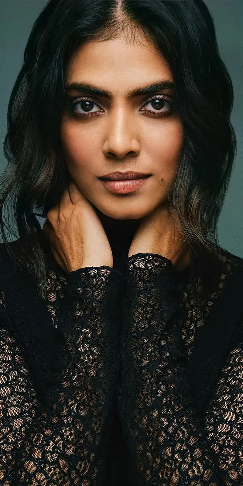 Attractive Wallpaper of Malavika Mohanan in a Black Outfit