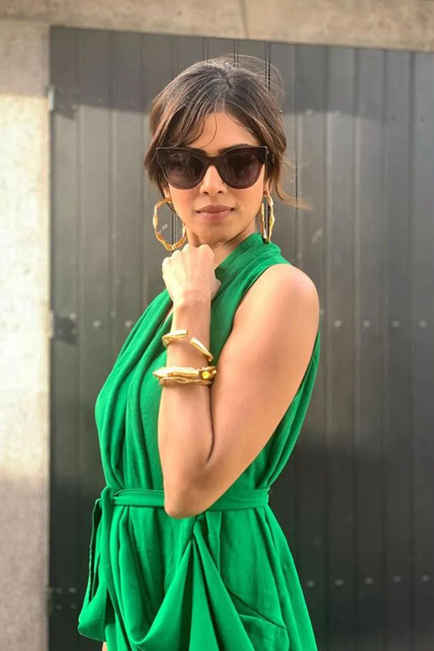 Attractive Wallpaper of Malavika Mohanan Modern Green Outfit