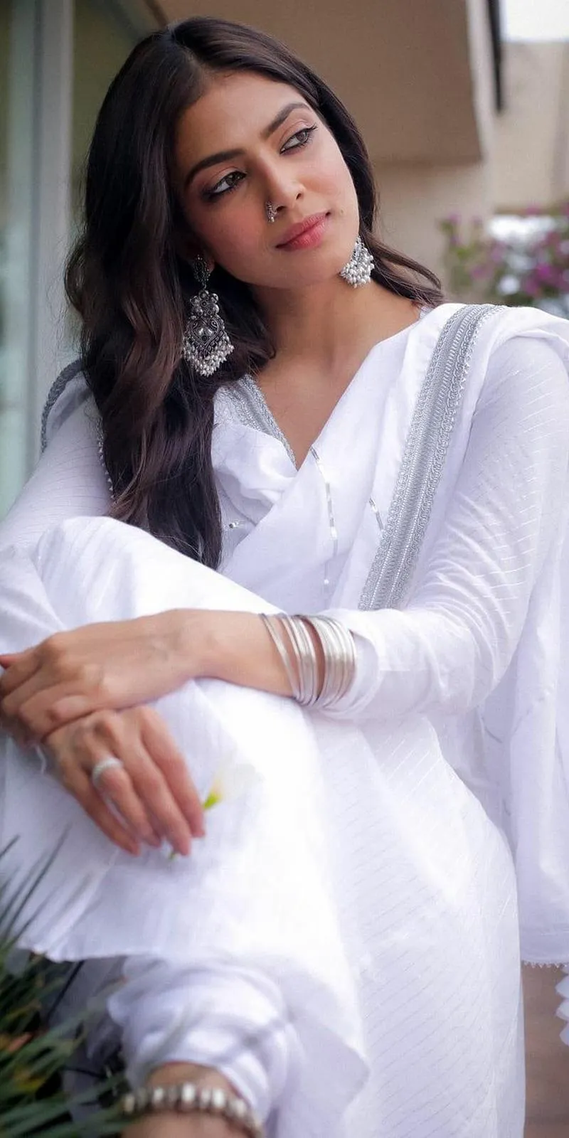 Beautiful Image of Malavika Mohanan Graceful in White Gown