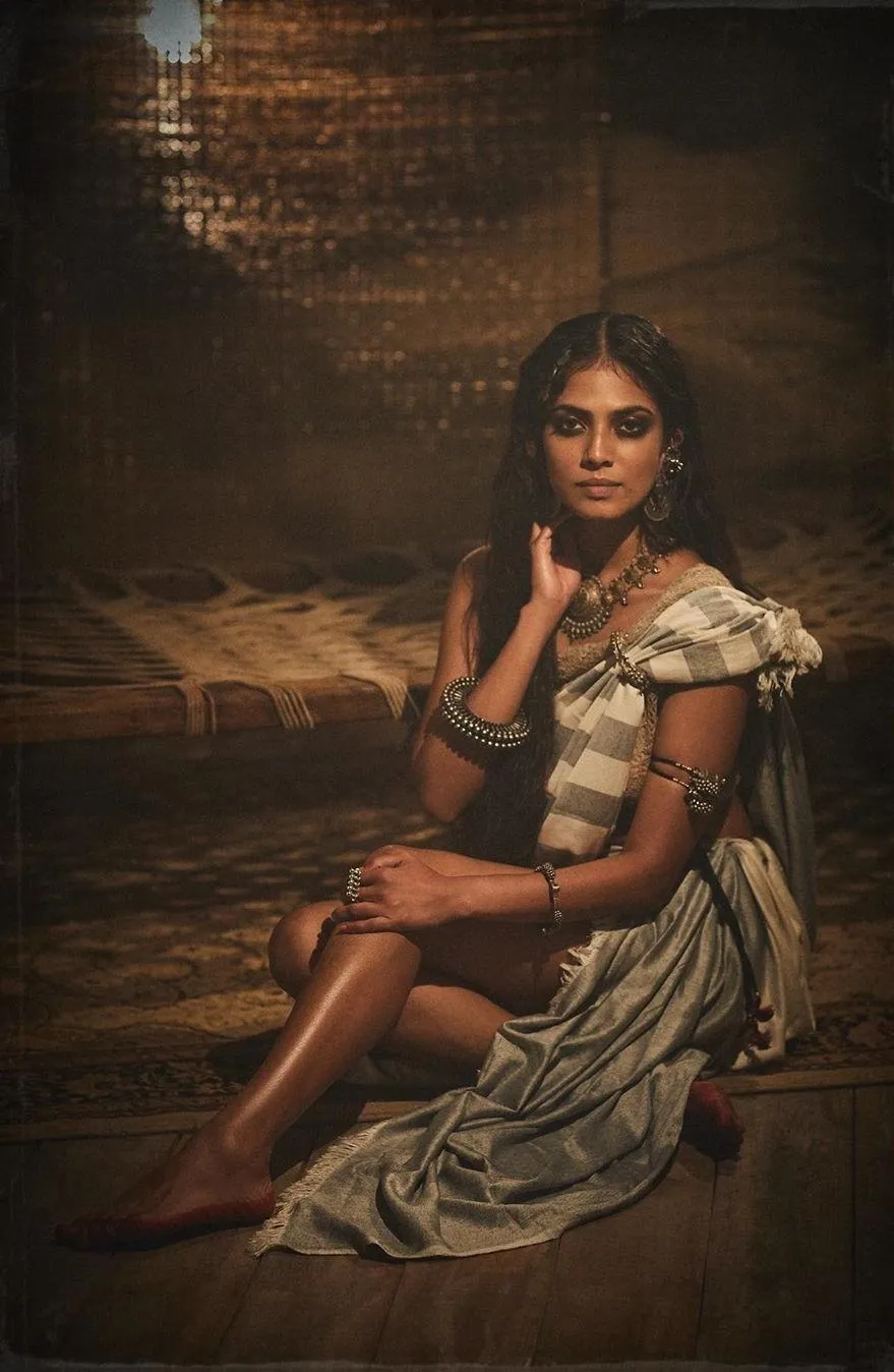 Beautiful Image of Malavika Mohanan Smiling in Brown Saree