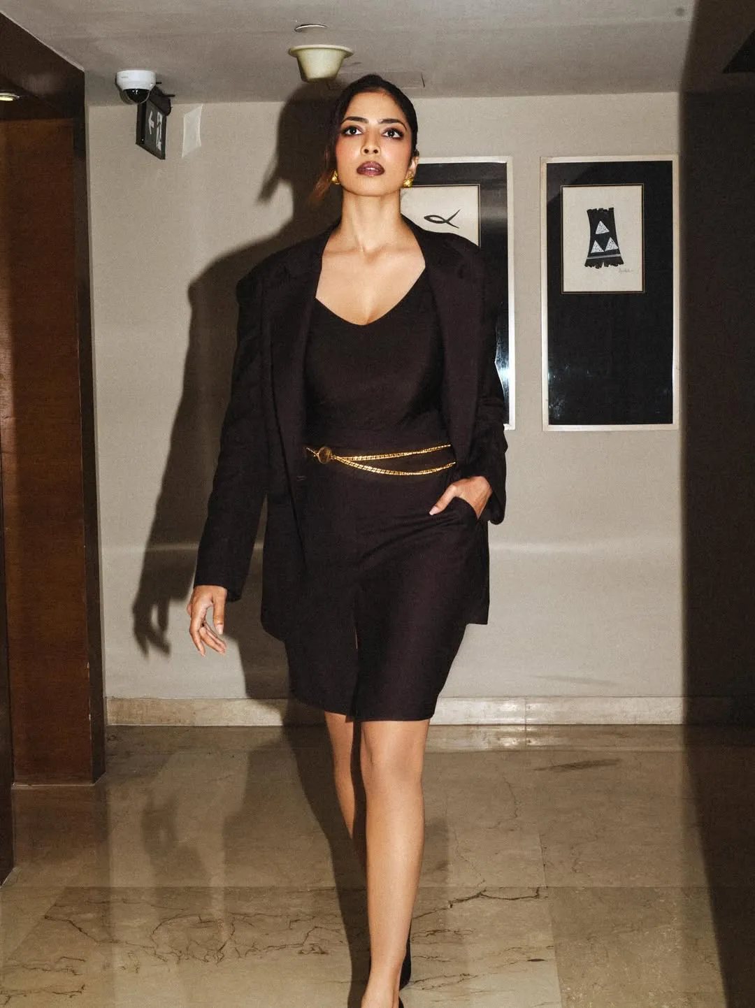 Beautiful Malavika Mohanan in Black Mini Dress Chic Pose