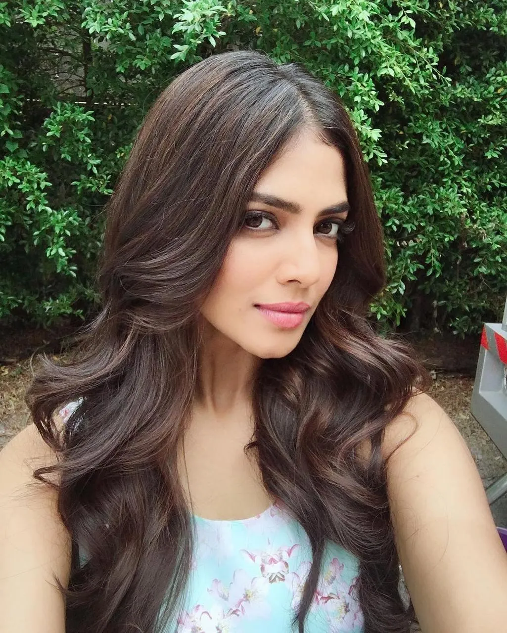 Beautiful Malavika Mohanan in Blue Floral Dress Soft Pose