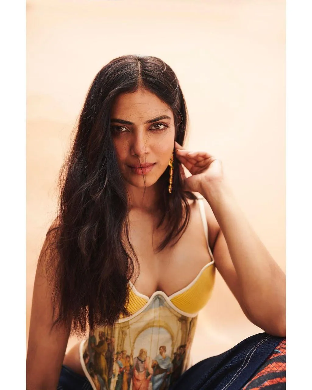 Beautiful Malavika Mohanan in Elegant Seated Pose Natural