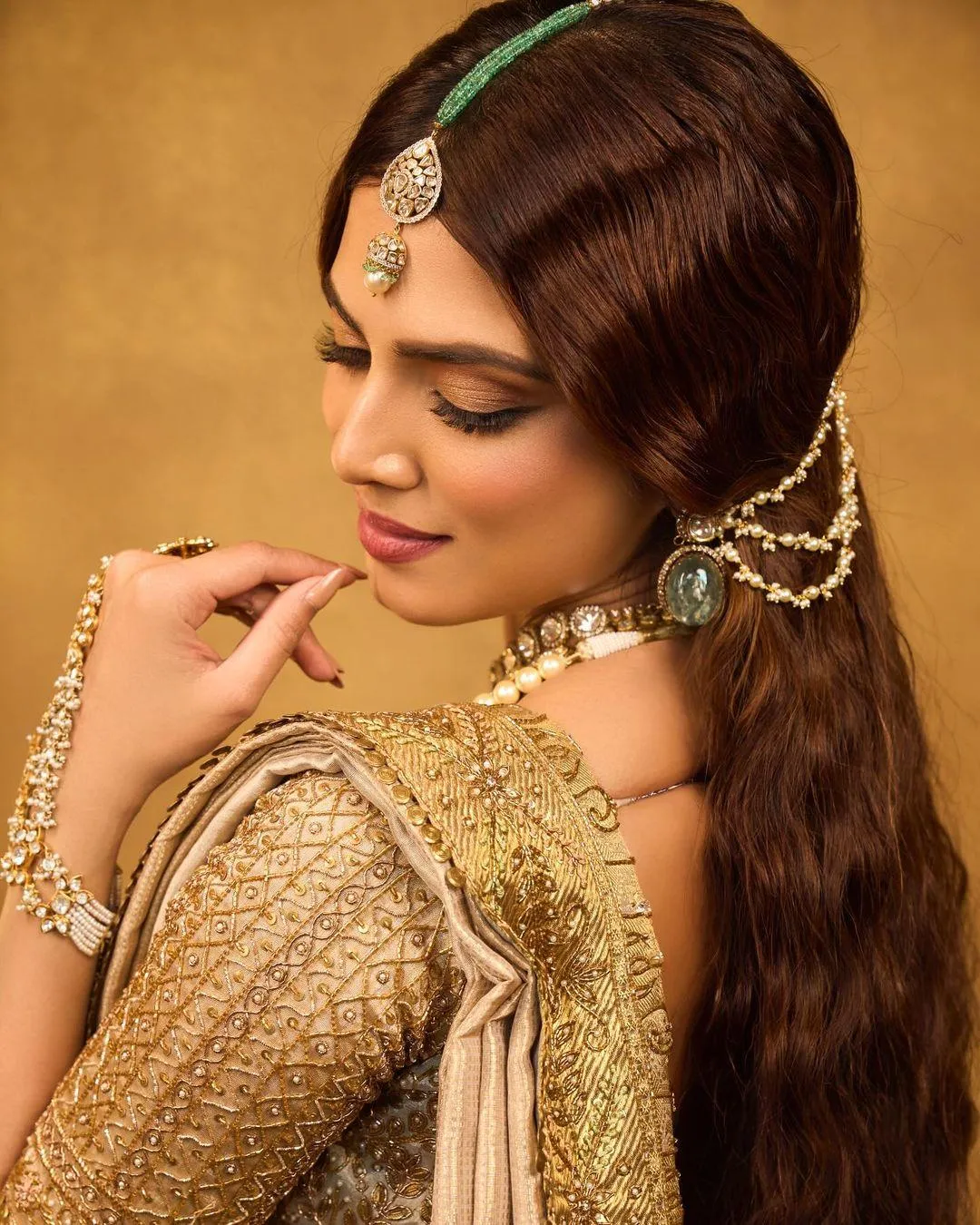 Beautiful Malavika Mohanan in Golden Saree Traditional Look