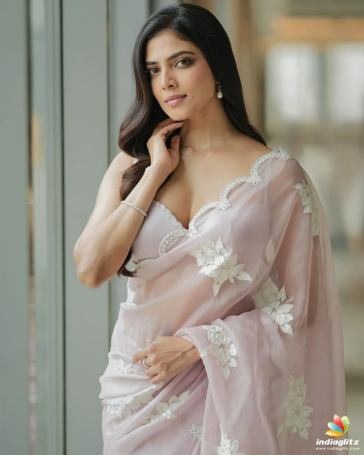 Beautiful Malavika Mohanan in Green Gown Chic Stunning Pose