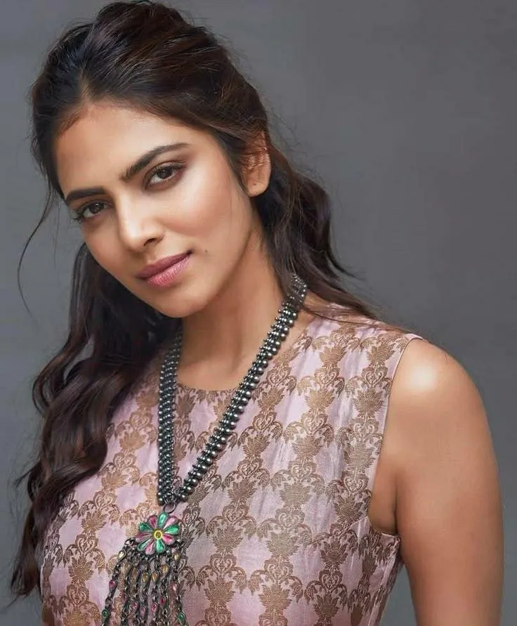 Beautiful Malavika Mohanan in Grey Sleeveless Party Wear